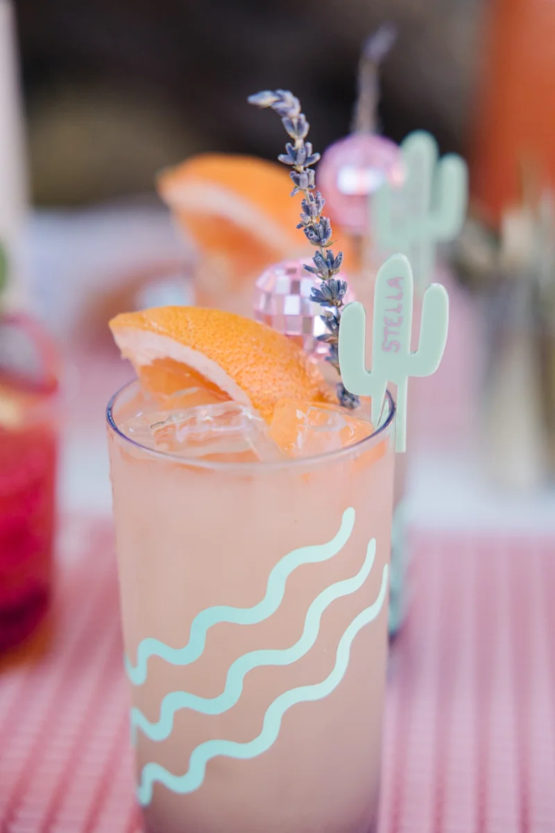 Citrus cocktail in a tall glass with a wavy decoration